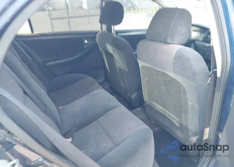 2004 Toyota Corolla Ce/Le/S z USA, uszkodzony, nr VIN 1NXBR32E94Z286806